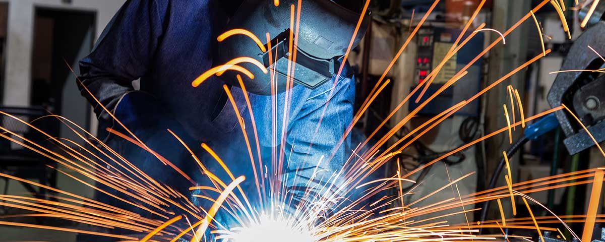 An image of a person welding