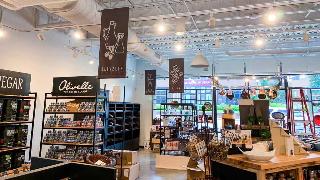 Hanging banners and retail display graphics in a grocery store.