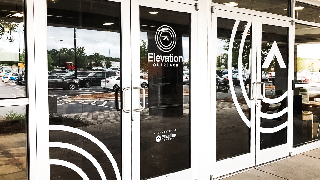 Window graphics on doors at Elevation Church in Greenville, South Carolina.