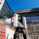 Leica RTC 360 laser scanner on a construction site.